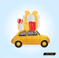 A small yellow car carries packages and gift boxes. Royalty Free Stock Photo